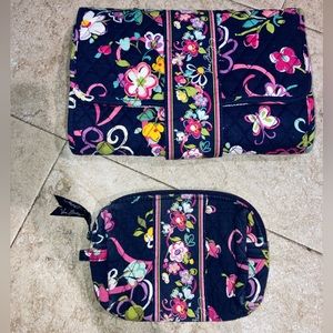 Bundle of Vera Bradley baby changing pad and cosmetic bag.